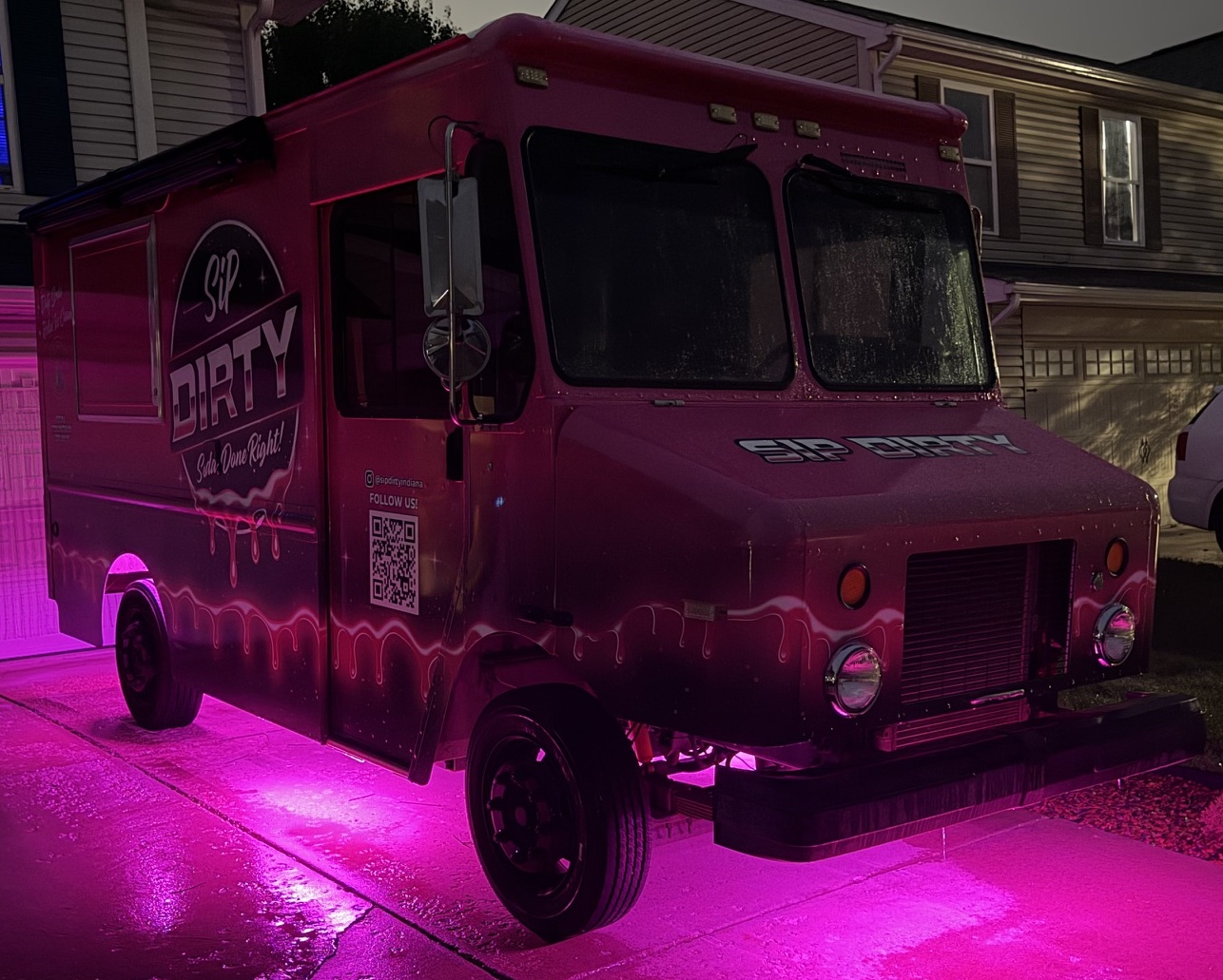 Sip Dirty pink truck serving guests at a private event